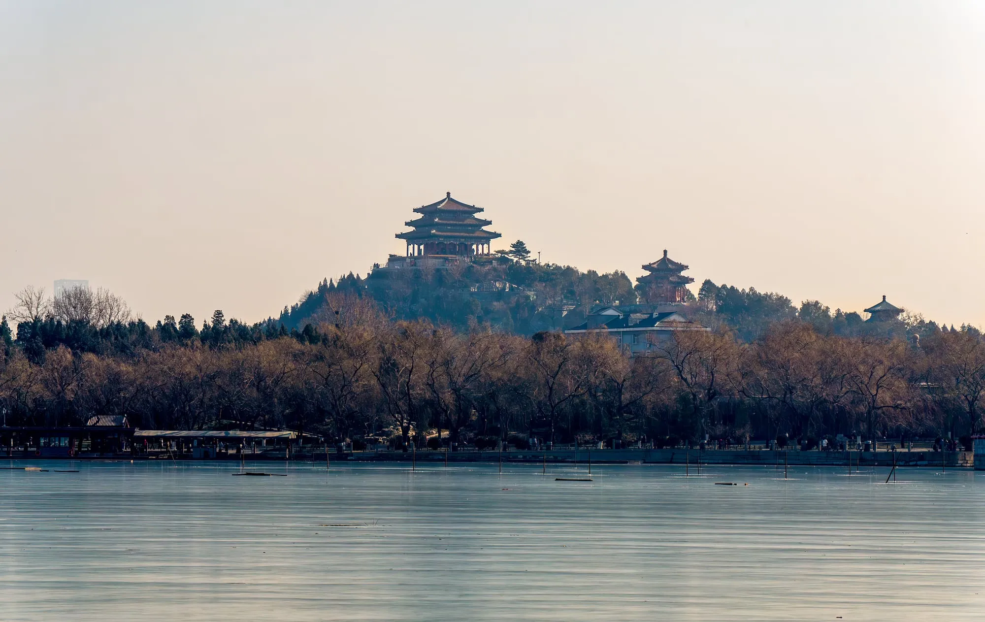Jingshan Park's hilltop pavilions seen across the water in Beijing